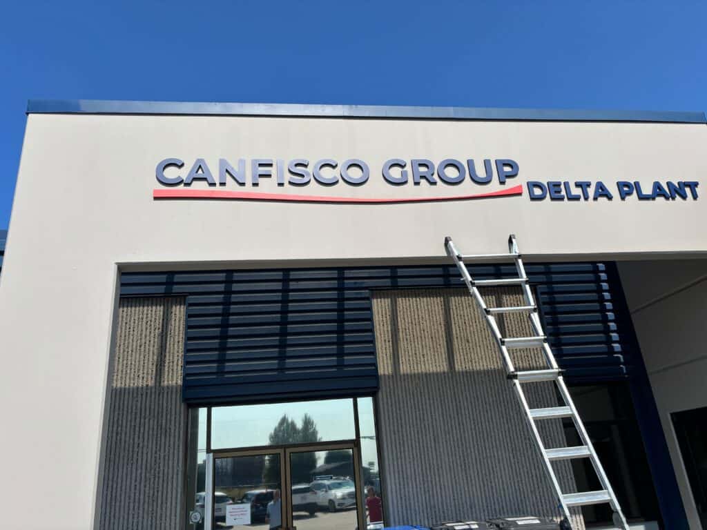 Custom dimensional outdoor sign installed for Canfisco Group. Exterior business signage designed to enhance brand visibility and create a professional storefront.