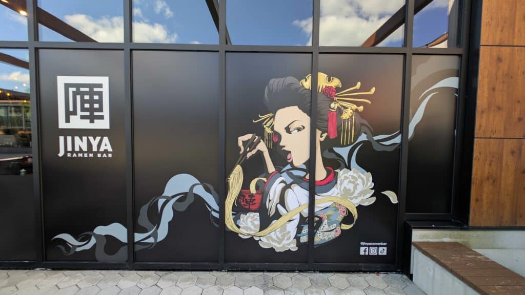 Custom window graphics installed for JINYA Ramen Bar. Professionally printed storefront graphics designed to enhance branding and attract customers.